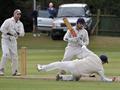 Michael Powell takes a diving catch to dismiss Dean Fearn.jpg